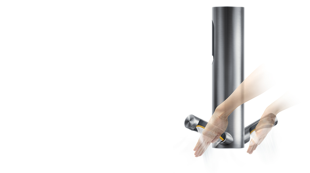 Hands being dried under a Dyson Airblade 9KJ hand dryer